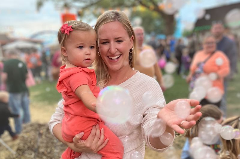 Mother & daughter with bubbles