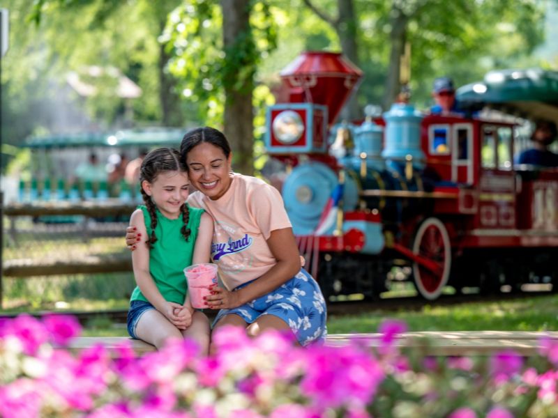 Family in front of Train